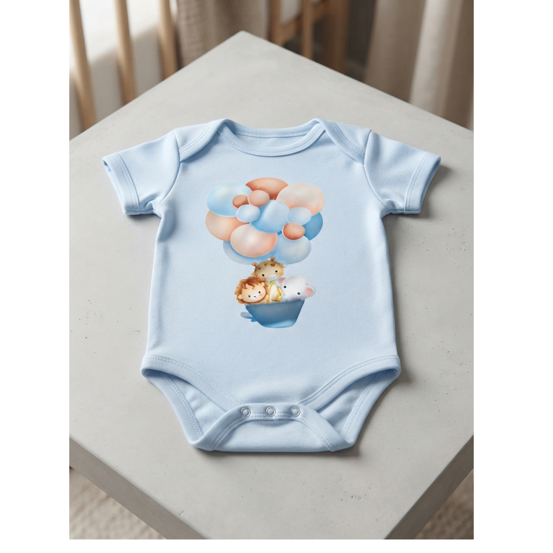 Body azul bebé con león conejito y osito en globo de colores pastel talla 6-12 meses